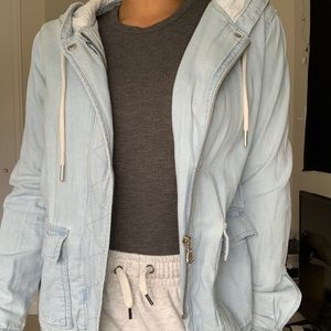 a light blue jacket
